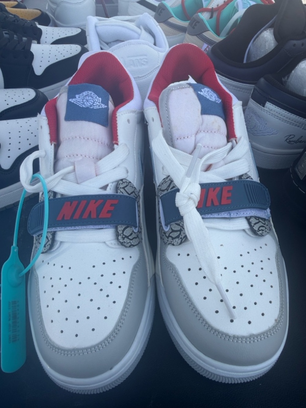 Nike Kids White, Gray & Blue Low-Top Sneakers with Red Lining